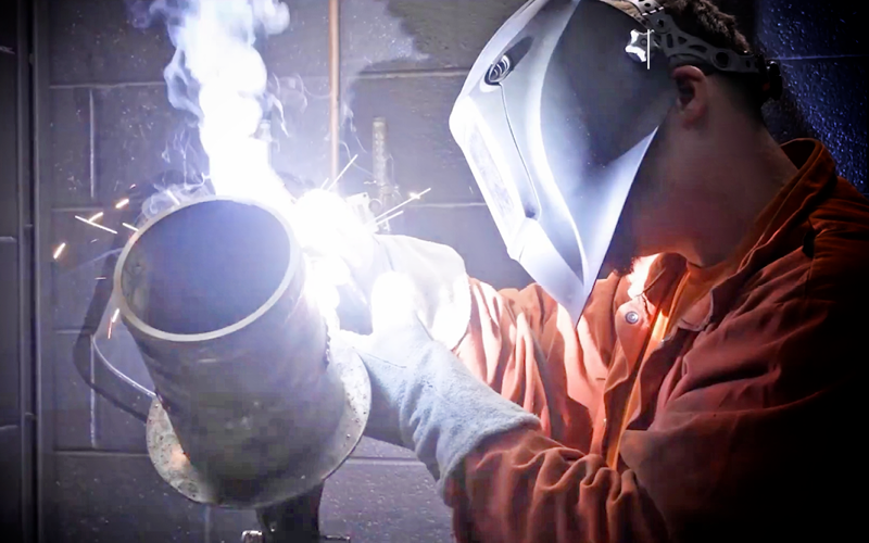 Graphic shows a veteran welding. National Hire a Veteran Day. July 25, 2020