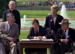 President George H.W. Bush signs the Americans with Disabilities Act on July 26, 1990. 