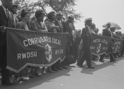 Marchers carrying labor union banners during the March on Washington in 1963