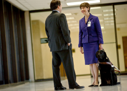Kathy Peery, a legislative affairs specialist for a federal agency, and her service dog