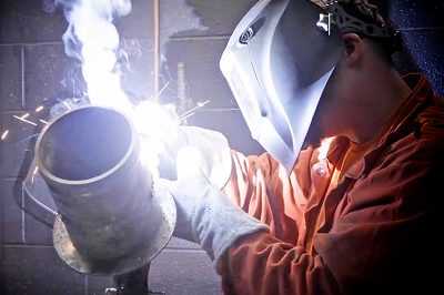 Alt text: Graphic shows a veteran welding. National Hire a Veteran Day. July 25, 2020.