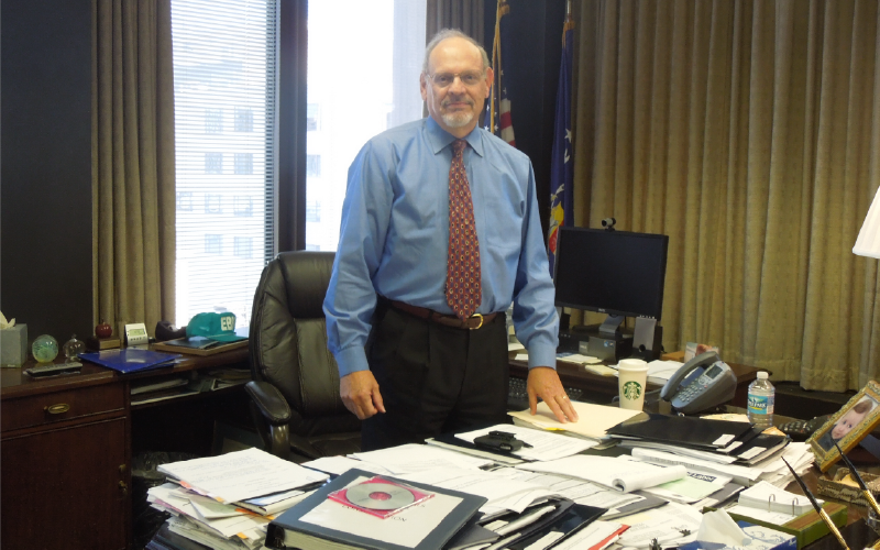 Alan Lebowitz at his desk.