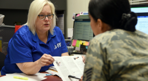 Chris Kern-Garcia with the 72nd Force Support Squadron Education Services Center informs a transitioning service member about the SkillBridge program. The program enables service members to intern, apprentice, job shadow and receive on-the-job training in the civilian workforce during their last 180 days of active duty, in order to learn skills that may differ from their military job. (U.S. Air Force photo/Kelly White) 