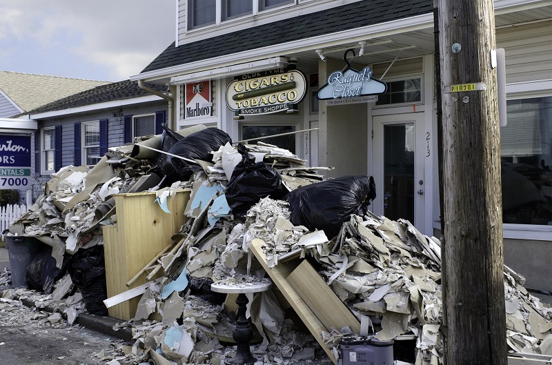 An image of the aftermath of a hurricane with debris scattered. 