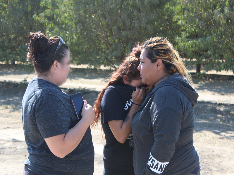 Corrina’s mother accompanied by family members at the site of the accident