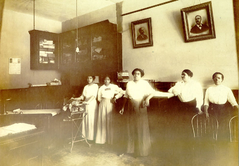 Maggie Lena Walker (second from right) with four accountants employed by the Independent Order of Saint Luke. I