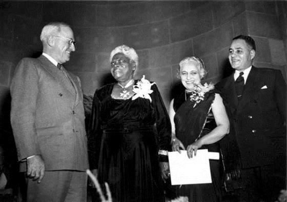 President Harry Truman, Mary McLeod Bethune, Madame Vijaya Pandit, Dr. Ralph J. Bunche. 