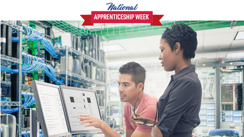 Two people work on a computer in a high-tech environment. The text reads "National Apprenticeship Week"