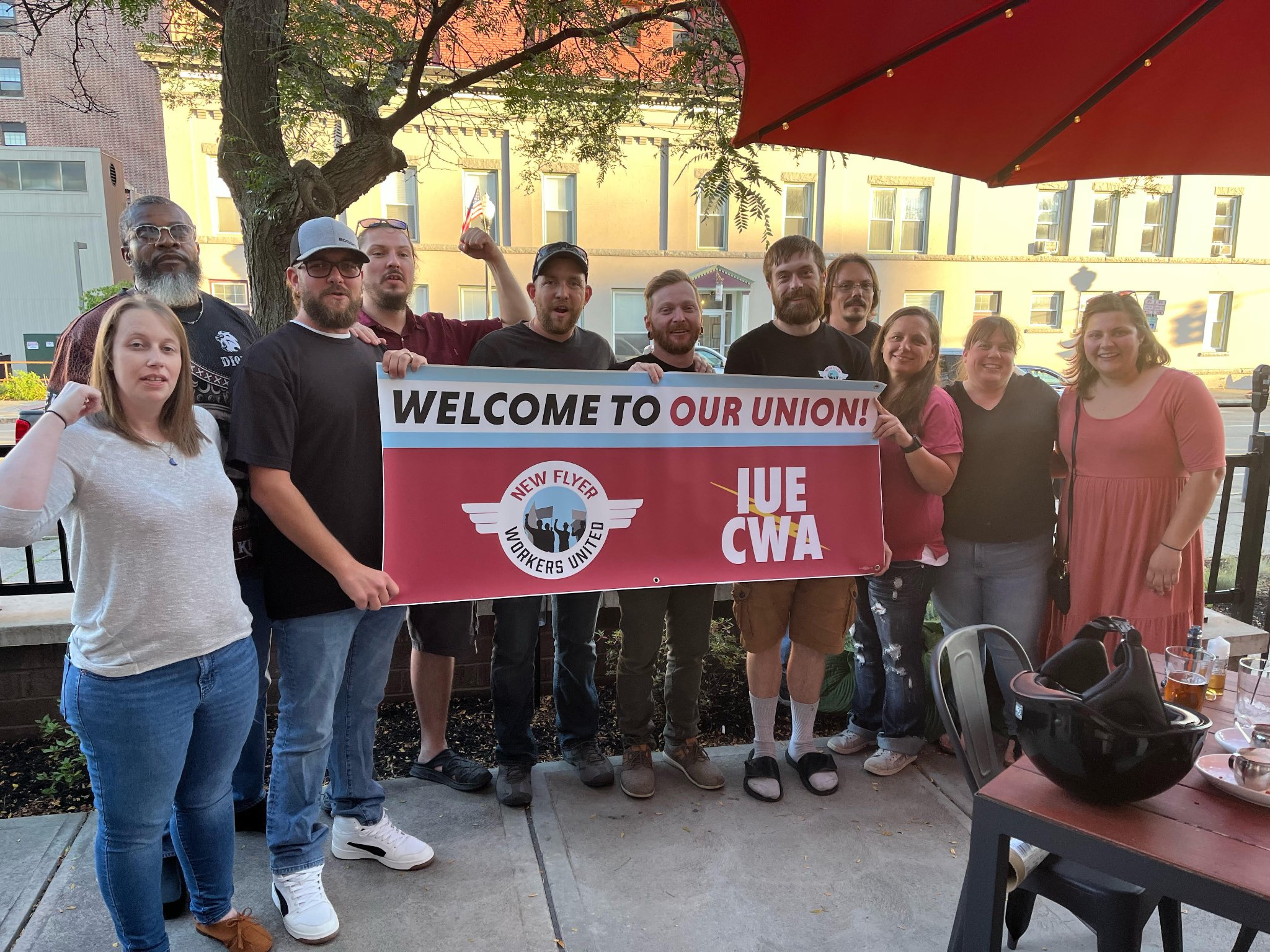 Workers at New Flyer celebrate their employer's voluntary recognition of their union.