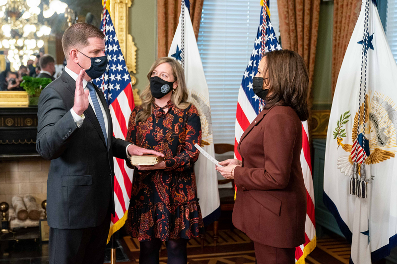 Secretary Walsh being sworn in by VP Kamala Harris in the White House.
