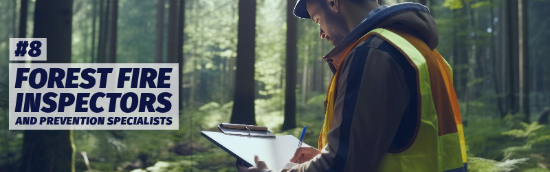 A man wearing a high visibility vest takes notes on a clipboard in the forest. "Number eight: Forest fire inspectors and prevention specialists"