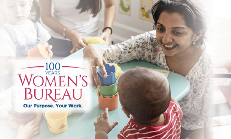 Women's Bureau Centennial logo on a photo of a woman playing with a small child in an educational setting