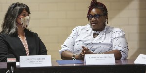 Women's Bureau Director Wendy Chun-Hoon listens to Kimber Washington speak at a roundtable.