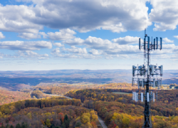Cell phone or mobile service tower in forested area of West Virginia providing broadband service - stock photo