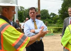 Secretary Marty Walsh joins St. Louis county workers and union workers at a bridge reconstruction site.