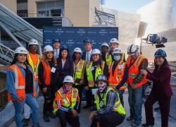 Secretary of Labor Marty Walsh and Deputy Secretary Julie Su with construction workers and apprentices at the Grand Avenue Project in Los Angeles