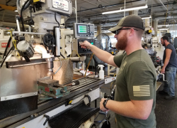 Apprentice Jacob Millichamp hones his machining skills while attending the Rock Island Arsenal-Joint Manufacturing and Technology Center's apprenticeship program in Illinois. U.S. Army photo by Debralee Best/RIA-JMTC, 2019.