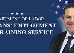 Veterans' Employment and Training Service - official portrait shows a white man in a suit in front of the Labor Department flag