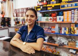 Young woman cashier in a hardware store
