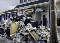 An image of the aftermath of a hurricane with debris scattered. 