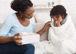 A mother caring for her sick child.