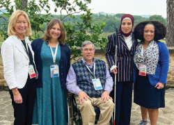 Assistant Secretary of Labor for Disability Employment Policy Taryn M. Willams with four other attendees of the G7 Ministerial Meeting on Inclusion and Disability in Umbria, Italy, in October 2024. Two people in the photo have visible physical disabilities.    