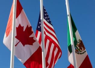 Flags of Canada, the United States and Mexico