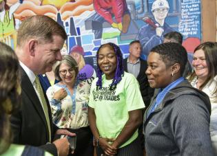 Secretary Walsh meets with a group of grantees