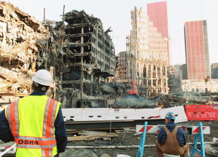 An OSHA employee looks over recovery efforts at Ground Zero