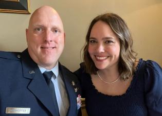 Anne Danhoffer poses for a photo with her husband Mike, who wears a U.S. Air Force uniform.