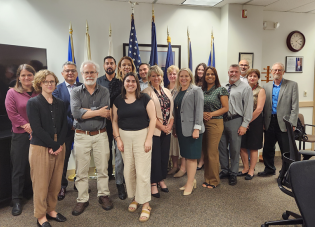 Diego Low (fourth from left) with other worker advocates and Wage and Hour Division staff