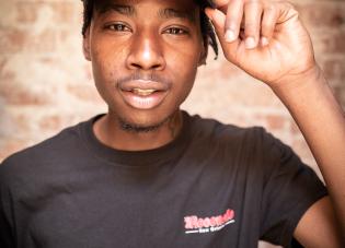 Headshot of Gomol, a student from STRIVE Future Leaders in New Orleans