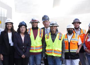 Secretary Marty Walsh and Deputy Secretary Julie Su with apprentices in LA.