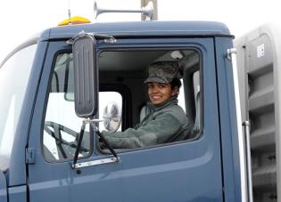 A woman driving a truck