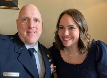 Anne Danhoffer poses for a photo with her husband Mike, who wears a U.S. Air Force uniform.